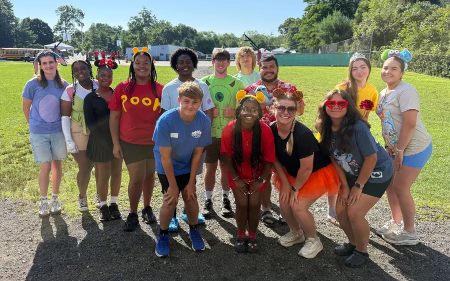 Camp Riverside counselors posing together on the grounds